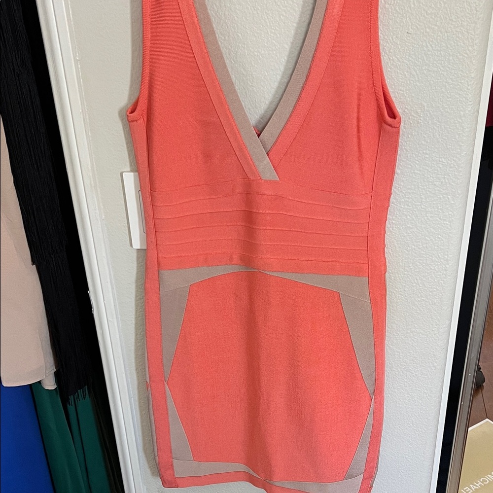 Coral and beige bandage dress bebe size large. Never worn but no tags